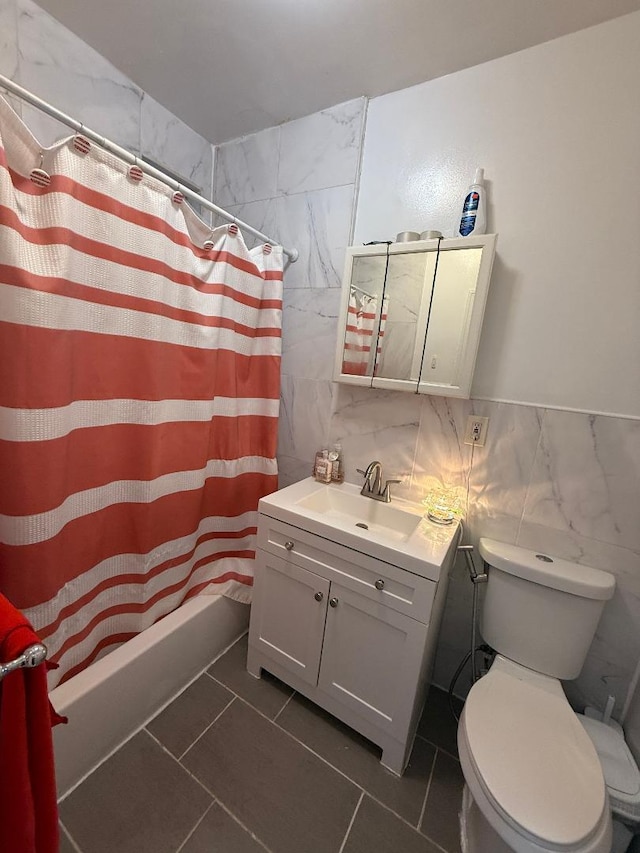 1956 Anthony Ave, Bronx, NY 10457 - bathroom with tile walls, toilet, vanity, tile patterned flooring, and shower / bathtub combination with curtain