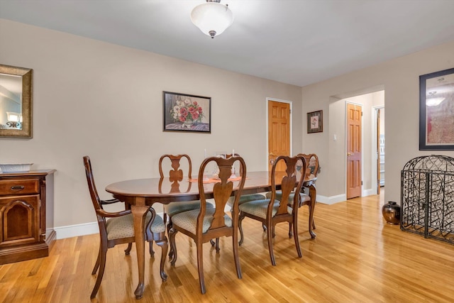 209-25 18th Ave Unit 3J, Bayside, NY 11360 - dining room featuring light wood-style floors and baseboards