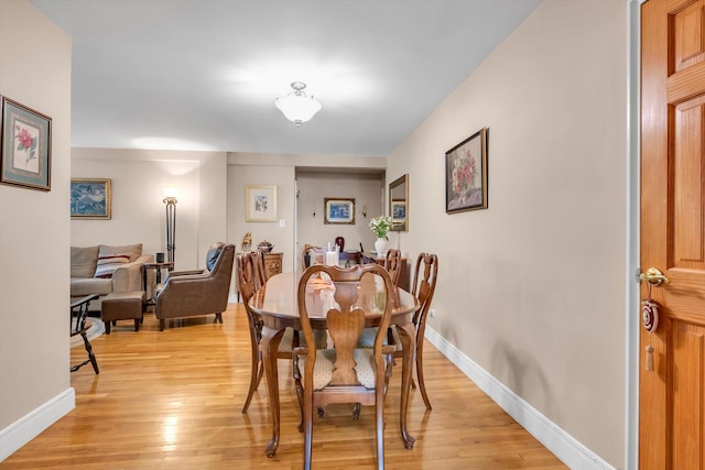 209-25 18th Ave Unit 3J, Bayside, NY 11360 - dining space featuring light wood finished floors and baseboards
