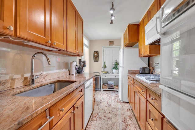209-25 18th Ave Unit 3J, Bayside, NY 11360 - kitchen with a sink, white appliances, brown cabinetry, and healthy amount of natural light