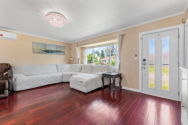 42 Macarthur Ave, Plainview, NY 11803 - living room with an AC wall unit, ornamental molding, wood finished floors, baseboards, and a chandelier
