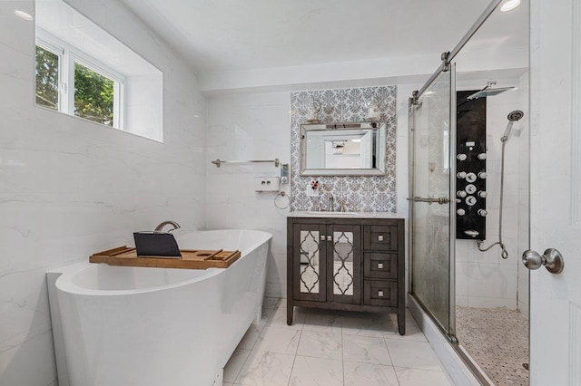 42 Macarthur Ave, Plainview, NY 11803 - full bathroom featuring marble finish flooring, a freestanding tub, a shower stall, and vanity