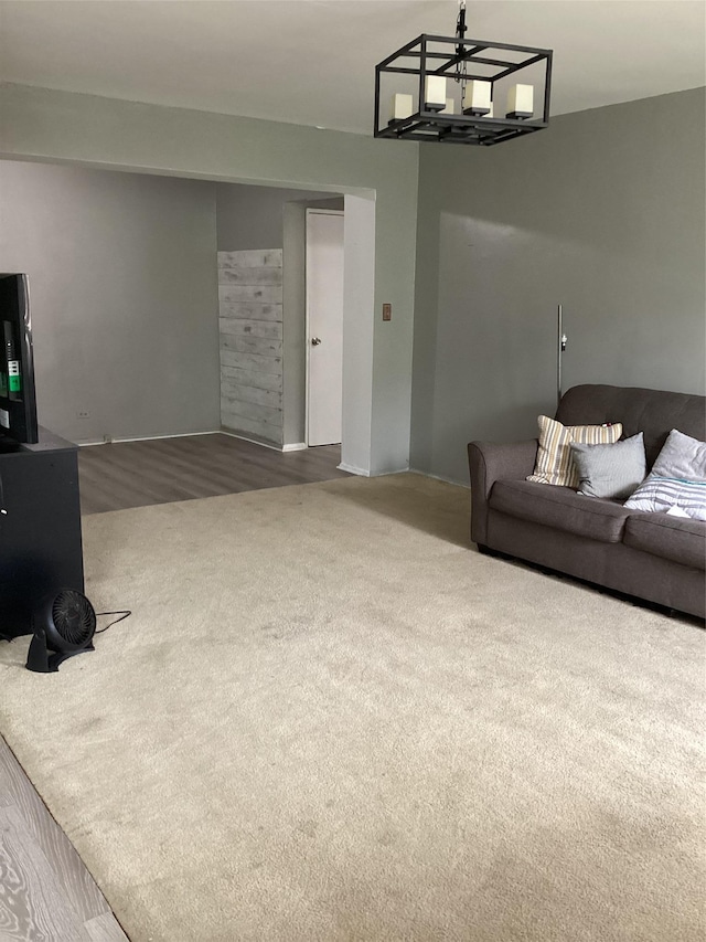 3176 Decatur Ave Unit 4F, Bronx, NY 10467 - carpeted living area with a chandelier