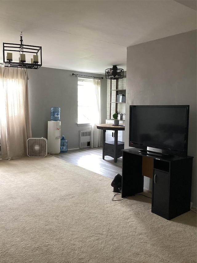3176 Decatur Ave Unit 4F, Bronx, NY 10467 - carpeted office featuring a chandelier and radiator