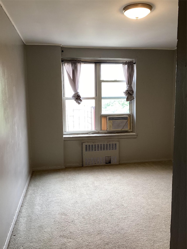 3176 Decatur Ave Unit 4F, Bronx, NY 10467 - unfurnished room featuring radiator, carpet, baseboards, and cooling unit