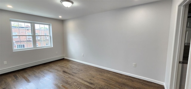 unfurnished room featuring a baseboard radiator, dark wood-style floors, baseboards, and recessed lighting