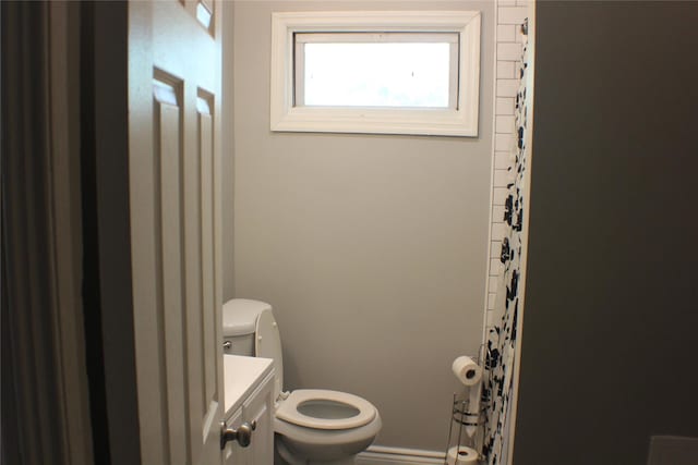 164 Winnikee Ave, Poughkeepsie, NY 12601 - bathroom featuring toilet, vanity, and curtained shower