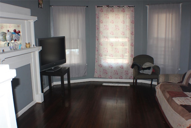 164 Winnikee Ave, Poughkeepsie, NY 12601 - sitting room with baseboards, dark wood finished floors, and a fireplace