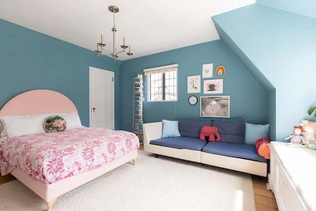 bedroom with a chandelier