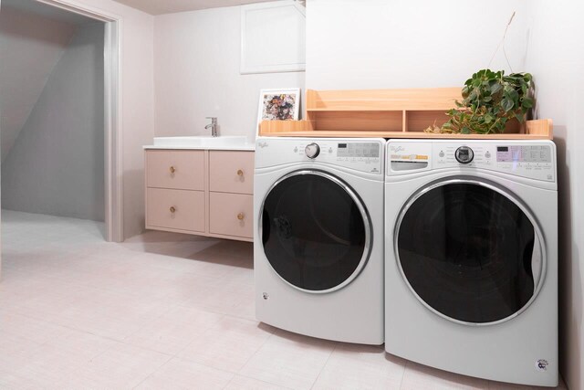 washroom featuring independent washer and dryer