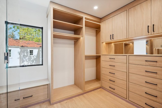 1 Bentley Rd, Great Neck, NY 11023 - walk in closet with light wood-style floors