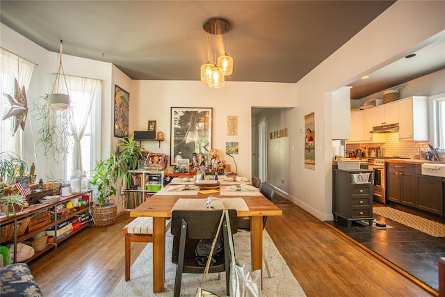 445 W Walnut St, Long Beach, NY 11561 - dining space with hardwood / wood-style floors