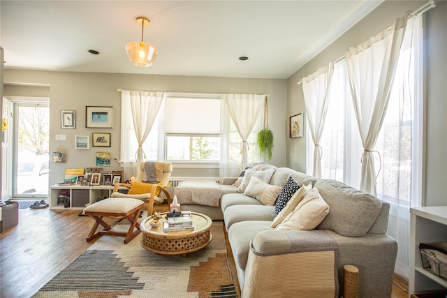 445 W Walnut St, Long Beach, NY 11561 - living room featuring healthy amount of natural light and wood finished floors