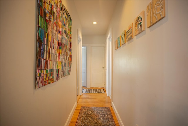 445 W Walnut St, Long Beach, NY 11561 - corridor with light wood finished floors, recessed lighting, and baseboards