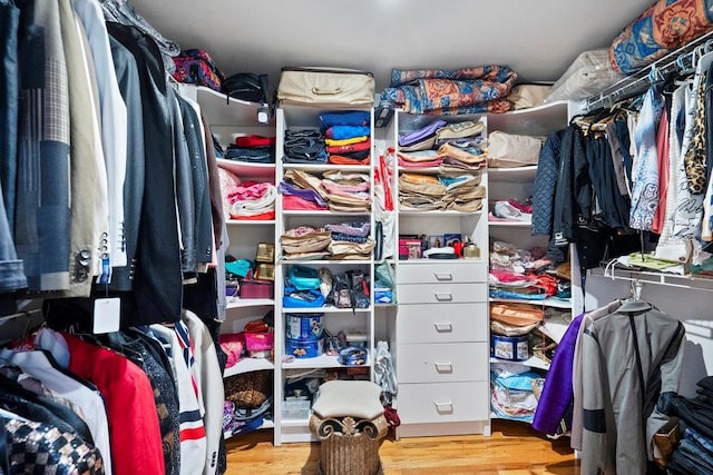 spacious closet with wood finished floors