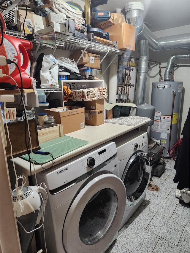 9-16 Bch 98th St, Rockaway Park, NY 11694 - clothes washing area with water heater, independent washer and dryer, and tile patterned floors