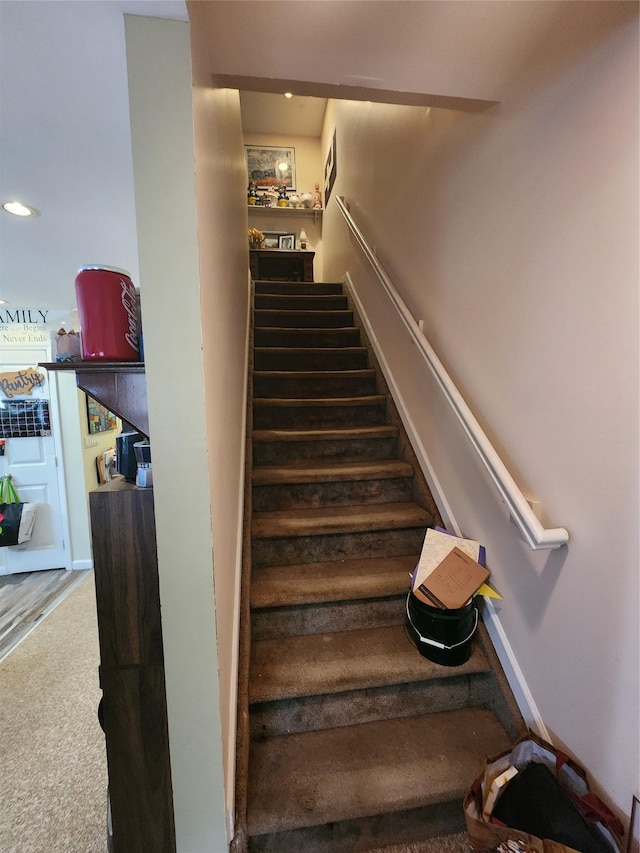 9-16 Bch 98th St, Rockaway Park, NY 11694 - stairway featuring carpet floors and recessed lighting