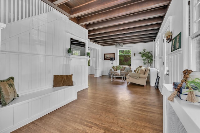 46 Mechanic St, Huntington, NY 11743 - foyer entrance with a decorative wall, wood finished floors, and wooden ceiling with exposed beams