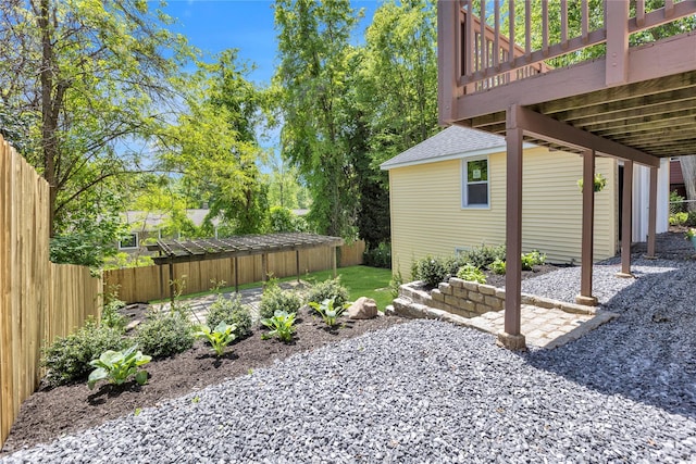 46 Mechanic St, Huntington, NY 11743 - fenced backyard with a wooden deck and a patio area
