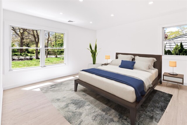 4 Pine Tree Ct, East Quogue, NY 11942 - bedroom with wood finished floors, recessed lighting, and baseboards