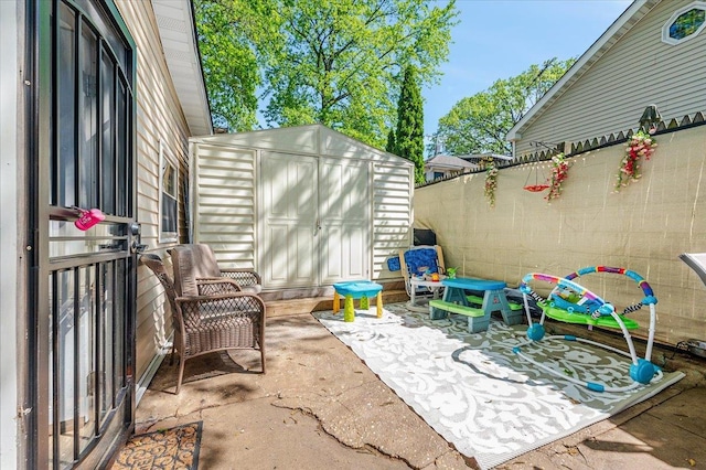 133B Edgewater Park Unit 133B, Bronx, NY 10465 - view of patio / terrace with a fenced backyard, a storage shed, and an outdoor structure