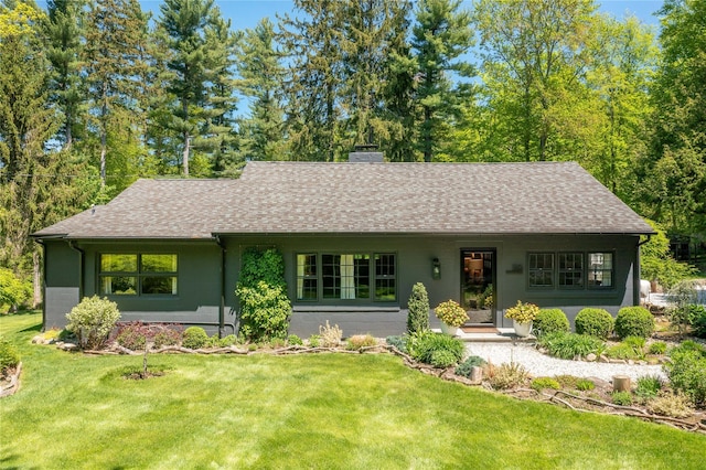 110 Sherwood Hill Rd, Brewster, NY 10509 - view of front facade featuring a front yard, roof with shingles, and a chimney