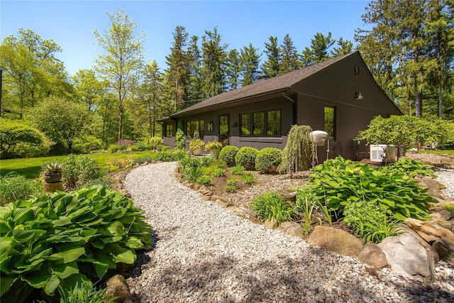 110 Sherwood Hill Rd, Brewster, NY 10509 - view of side of property with a shingled roof