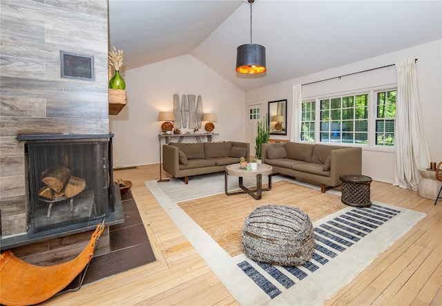 110 Sherwood Hill Rd, Brewster, NY 10509 - living area with hardwood / wood-style flooring, lofted ceiling, and a multi sided fireplace