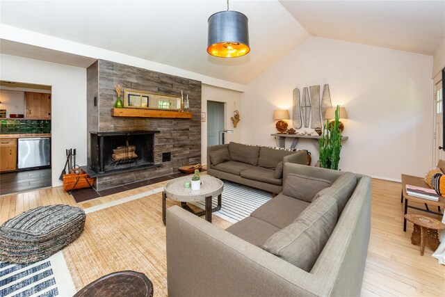 110 Sherwood Hill Rd, Brewster, NY 10509 - living room featuring hardwood / wood-style floors, vaulted ceiling, and a large fireplace