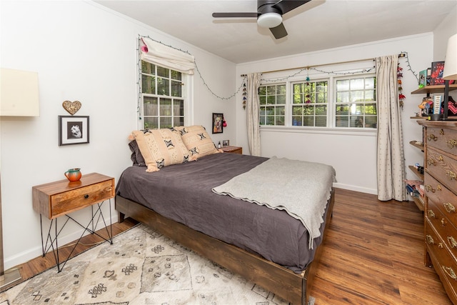110 Sherwood Hill Rd, Brewster, NY 10509 - bedroom with wood finished floors, multiple windows, baseboards, and crown molding