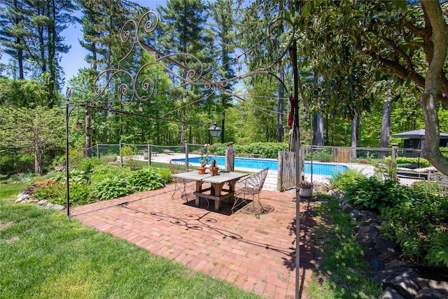 110 Sherwood Hill Rd, Brewster, NY 10509 - view of pool with fence, a patio area, and view of wooded area