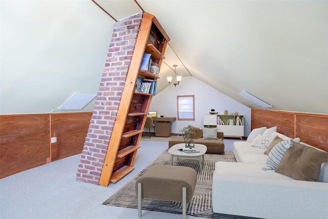living room featuring vaulted ceiling and carpet floors