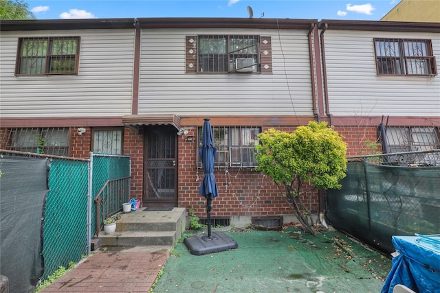 793 Jackson Ave, Bronx, NY 10456 - back of property with brick siding and fence