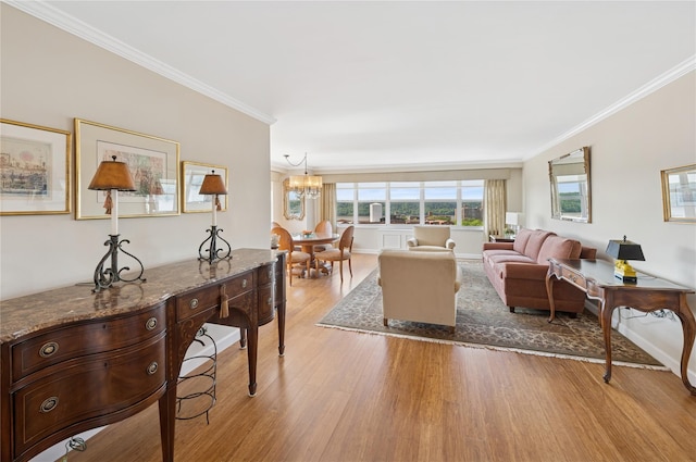 555 Kappock St Unit 20L, Bronx, NY 10463 - living area with crown molding, a chandelier, light wood-type flooring, and baseboards