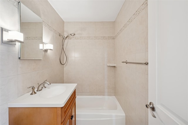 555 Kappock St Unit 20L, Bronx, NY 10463 - bathroom with vanity, shower / bathtub combination, and tile walls
