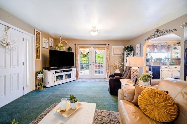 559 Noxon Rd, Poughkeepsie, NY 12603 - living area with french doors and carpet flooring