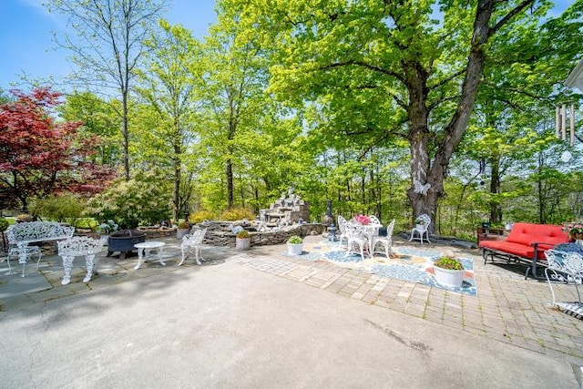 559 Noxon Rd, Poughkeepsie, NY 12603 - view of patio featuring view of wooded area