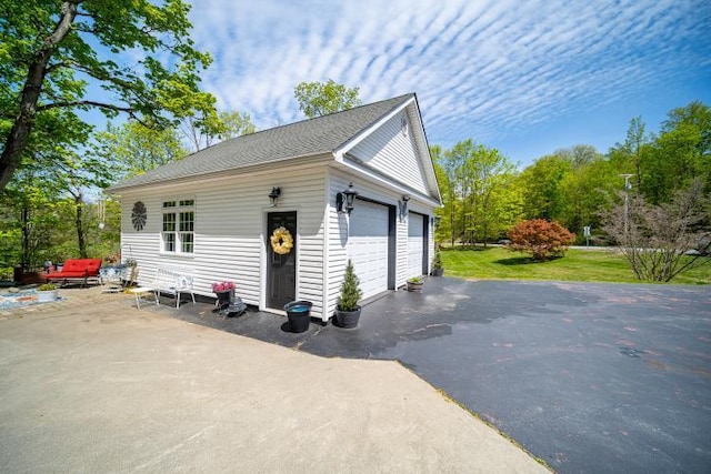 559 Noxon Rd, Poughkeepsie, NY 12603 - view of side of property featuring a detached garage