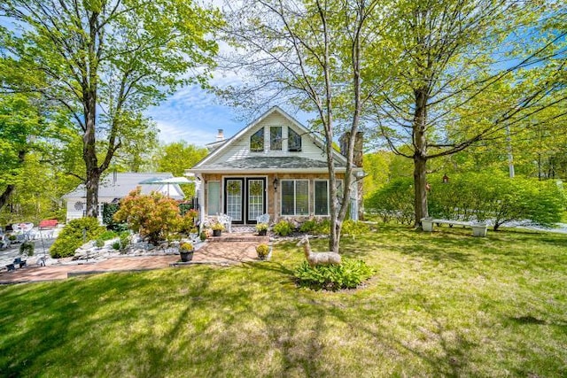 559 Noxon Rd, Poughkeepsie, NY 12603 - rear view of house with a yard and a patio area