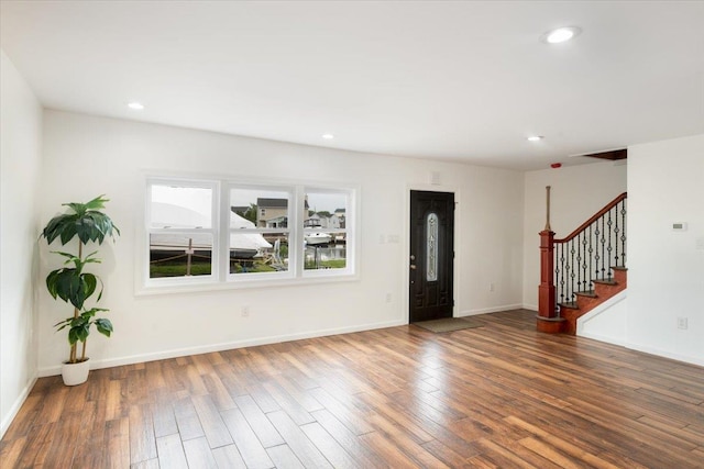886 S 8th St, Lindenhurst, NY 11757 - entryway featuring stairway, wood finished floors, baseboards, and recessed lighting
