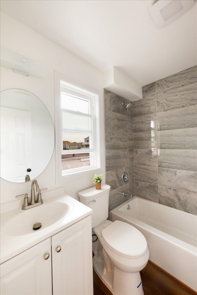 886 S 8th St, Lindenhurst, NY 11757 - bathroom with vanity, toilet, and shower / washtub combination