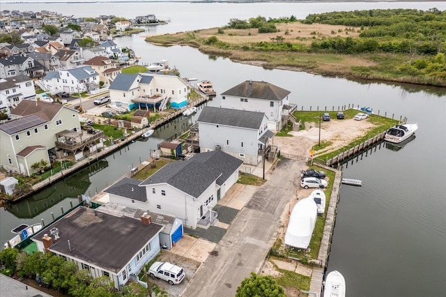 886 S 8th St, Lindenhurst, NY 11757 - aerial view of residential area featuring a nearby body of water