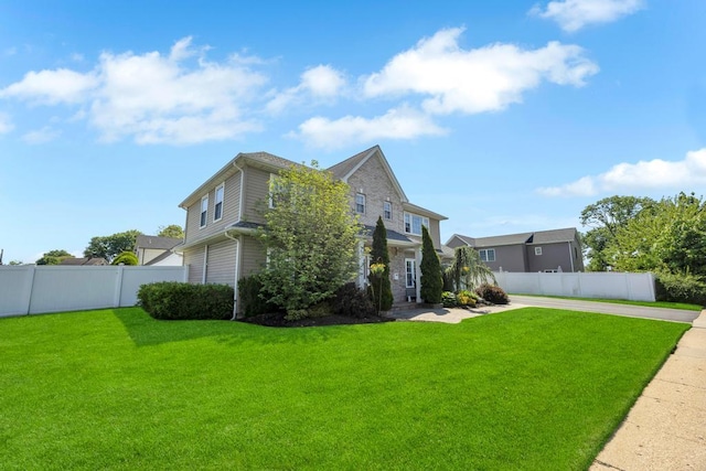59 Saddle Ln, Levittown, NY 11756 - rear view of house featuring stone siding