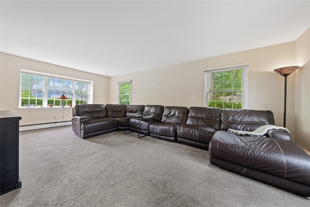living room featuring a baseboard radiator, carpet flooring, and healthy amount of natural light