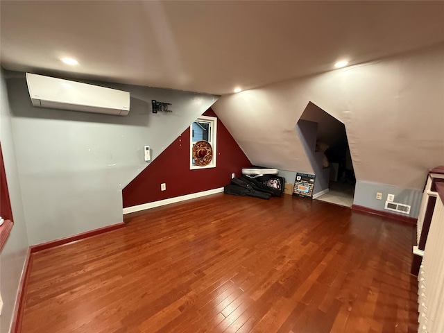 11 Glendale Rd, Greenwood Lake, NY 10925 - bonus room featuring a wall mounted AC, baseboards, wood finished floors, recessed lighting, and vaulted ceiling
