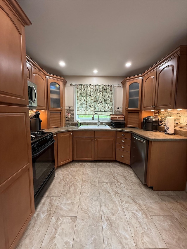 11 Glendale Rd, Greenwood Lake, NY 10925 - kitchen featuring a sink, appliances with stainless steel finishes, decorative backsplash, glass insert cabinets, and recessed lighting