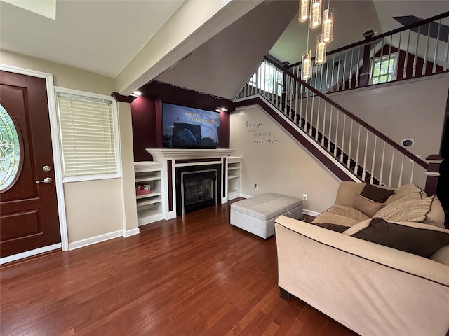11 Glendale Rd, Greenwood Lake, NY 10925 - living area featuring baseboards, wood finished floors, and stairway