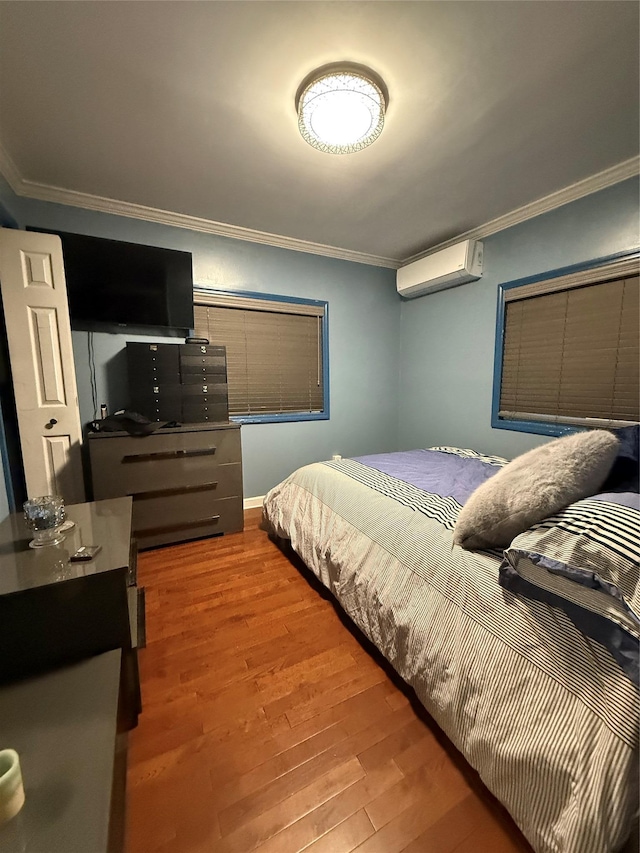 11 Glendale Rd, Greenwood Lake, NY 10925 - bedroom with ornamental molding, a wall mounted air conditioner, and wood finished floors
