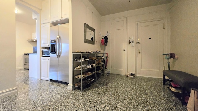 corridor featuring baseboards