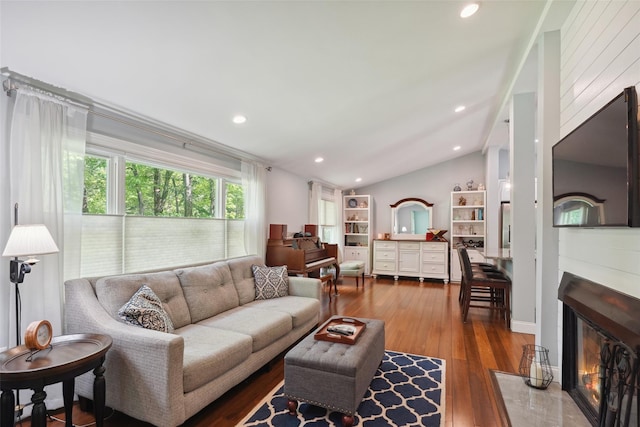 17 Kingswood Way, South Salem, NY 10590 - living area featuring a glass covered fireplace, hardwood / wood-style floors, lofted ceiling, and recessed lighting